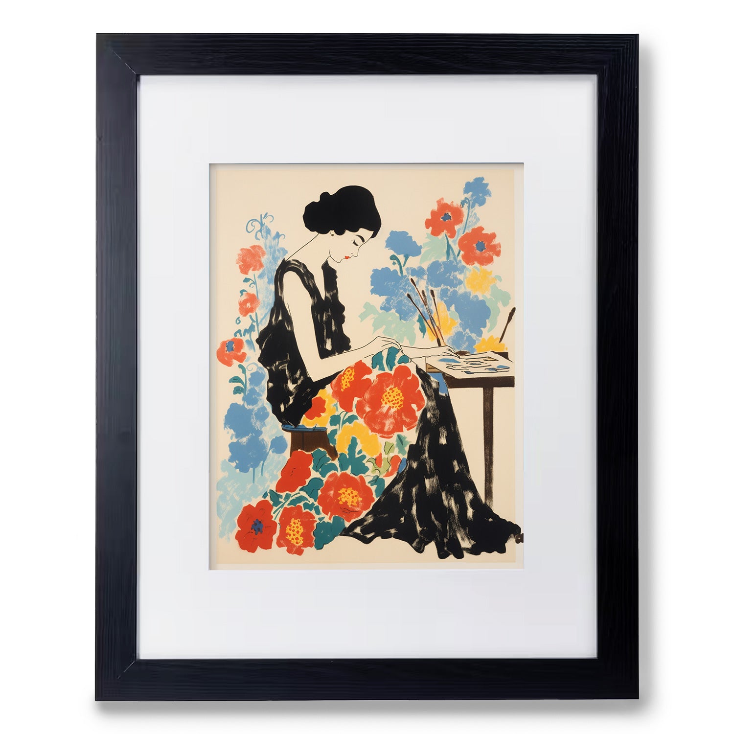 A vintage black framed print of "Sewing Some Kind of Wonderful" by Stannie & Lloyd, featuring a woman sitting at a table with flowers.
