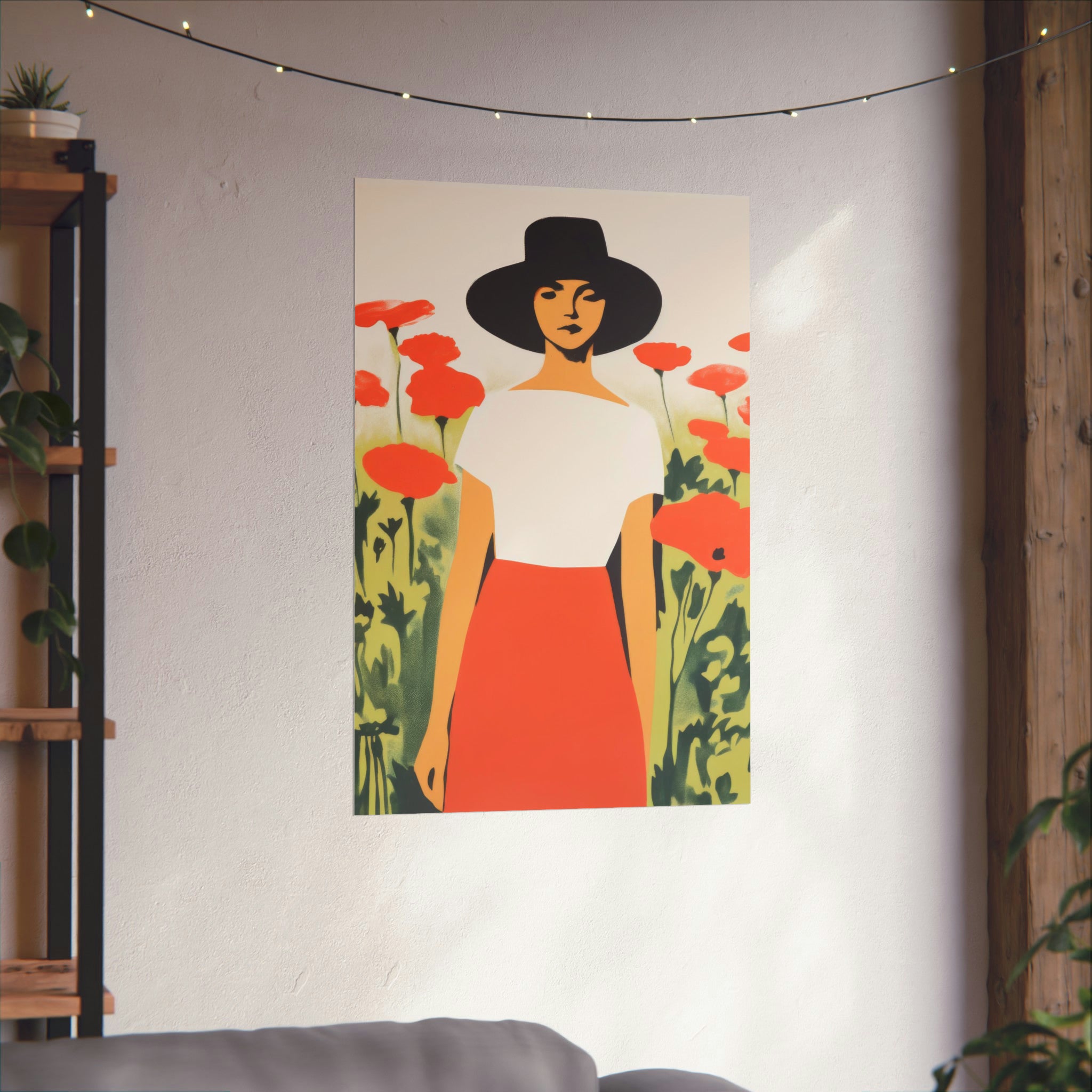 A wall-mounted poster of The Long Gaze by Printify, a stylized woman in a hat standing among red flowers, part of the wall decor for the living room, with warm lighting and houseplants.