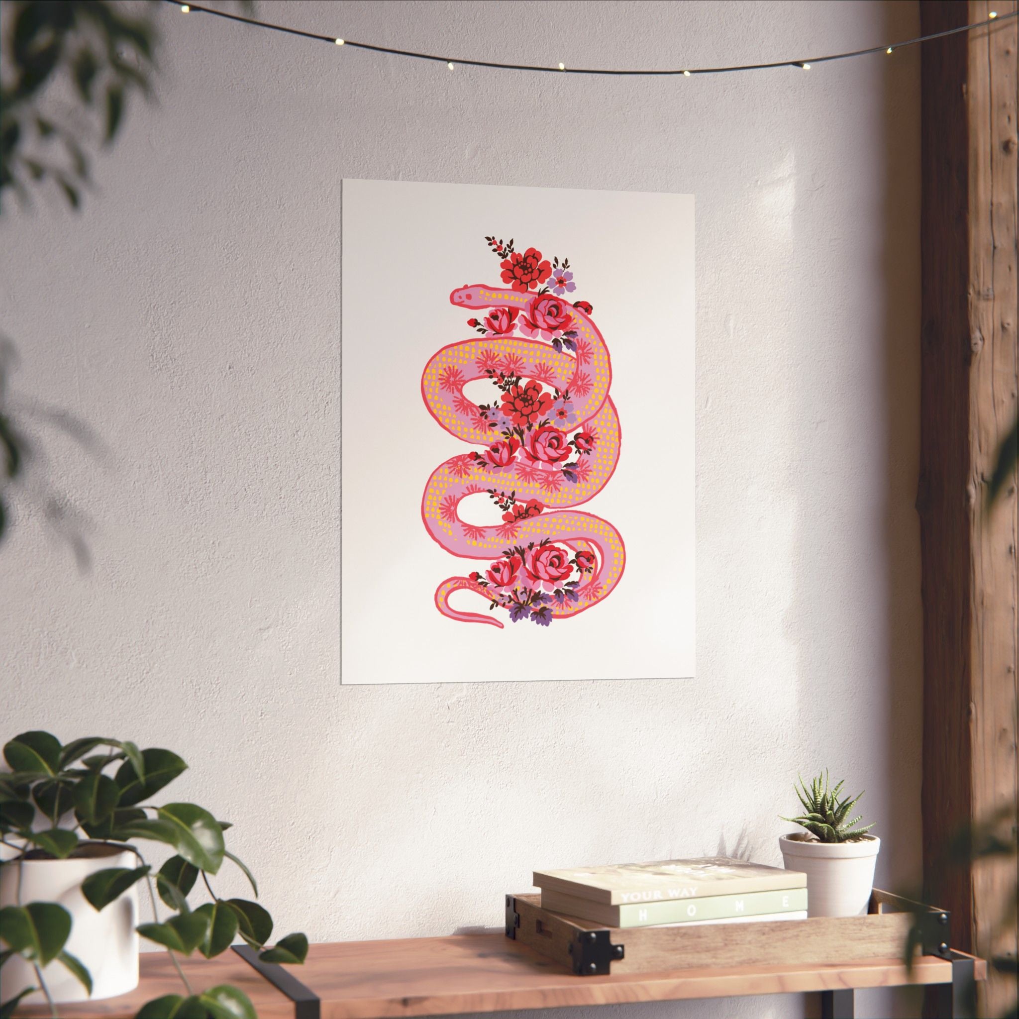 The "Snake with Roses | Large Matte Poster" by Printify features a pink and orange floral snake, printed on museum-grade matte paper for lasting beauty—perfect above your table or bookshelf. Available in 7 sizes.