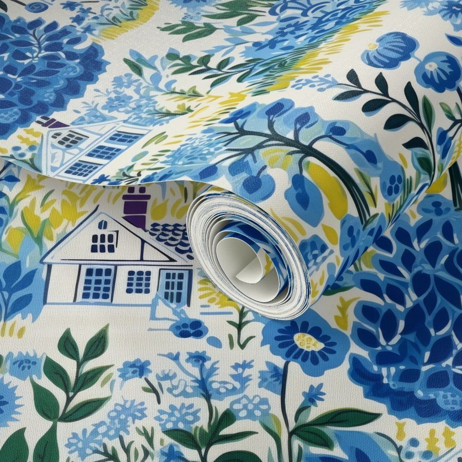 A roll of Cozy Cottage in Blue Wallpaper by Stannie & Lloyd featuring blue and yellow flowers with art prints, including a house motif.