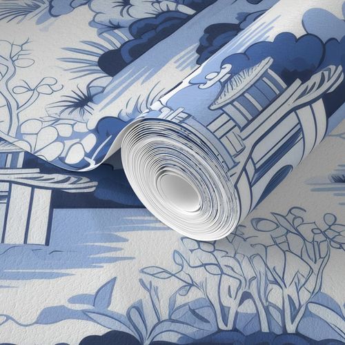 Roll of Large Blue Chinoiserie Wallpaper by Stannie & Lloyd unfurled over a flat surface.