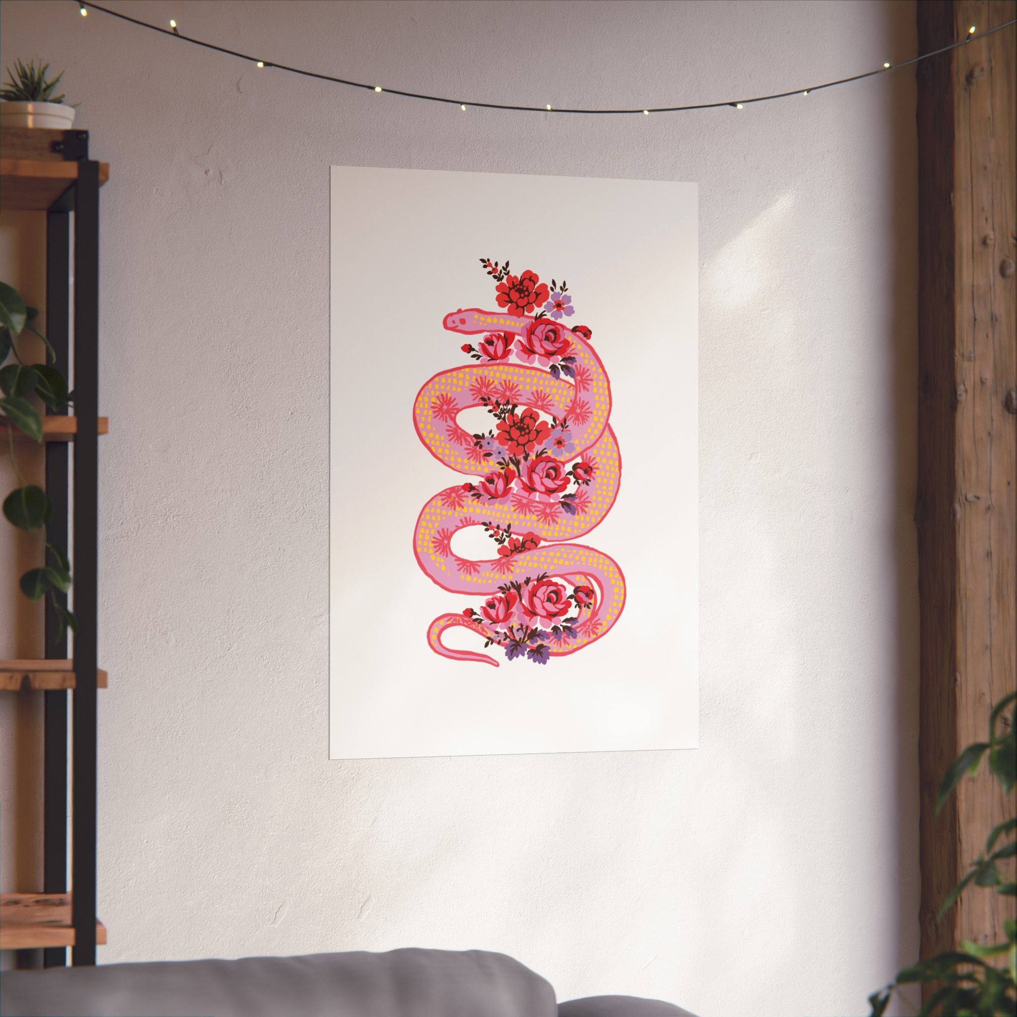 The "Snake with Roses" large matte poster by Printify features a pink and yellow snake among red and pink flowers, printed on archival fine art paper for lasting beauty. Available in 7 sizes.