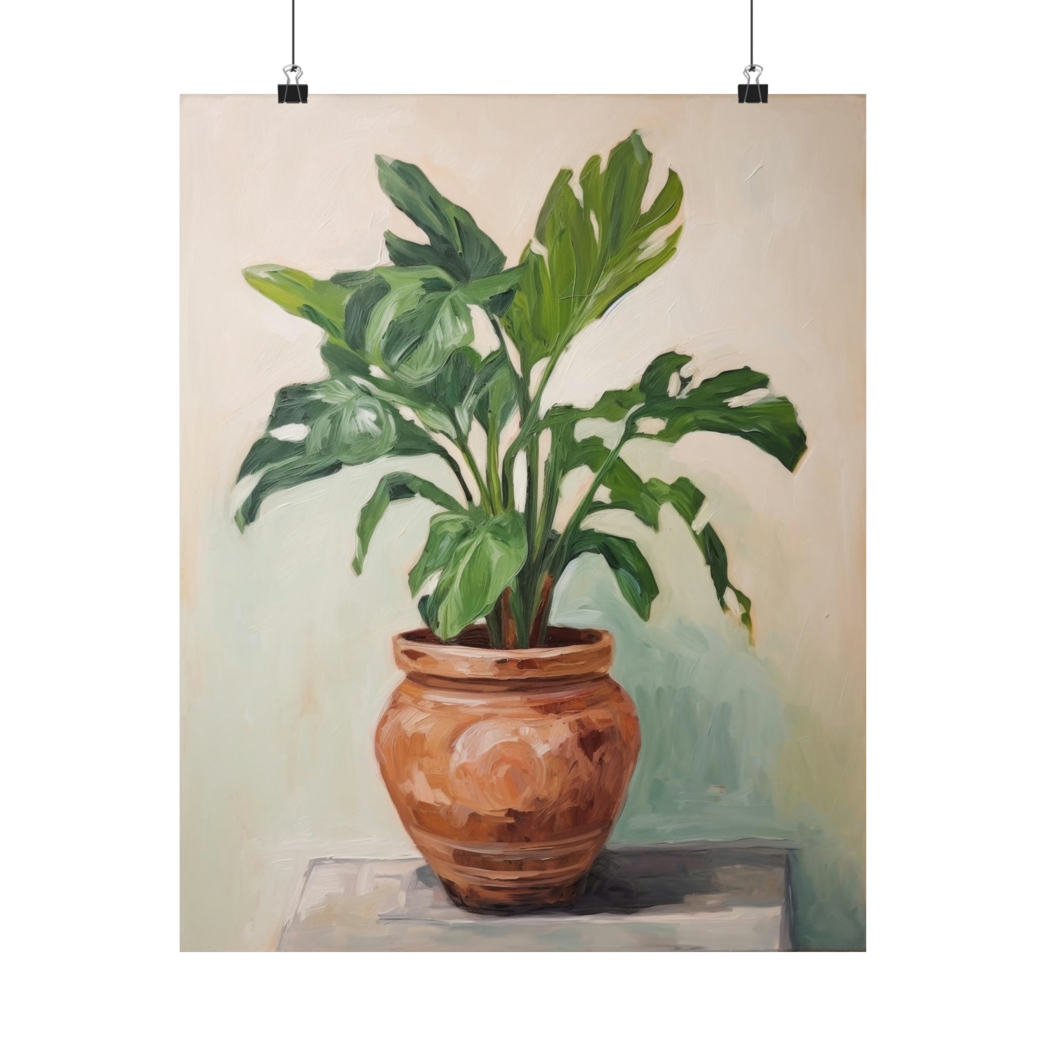 A Quiet and Still large matte poster of a green potted plant with broad leaves, serving as wall decor, hangs on the wall.