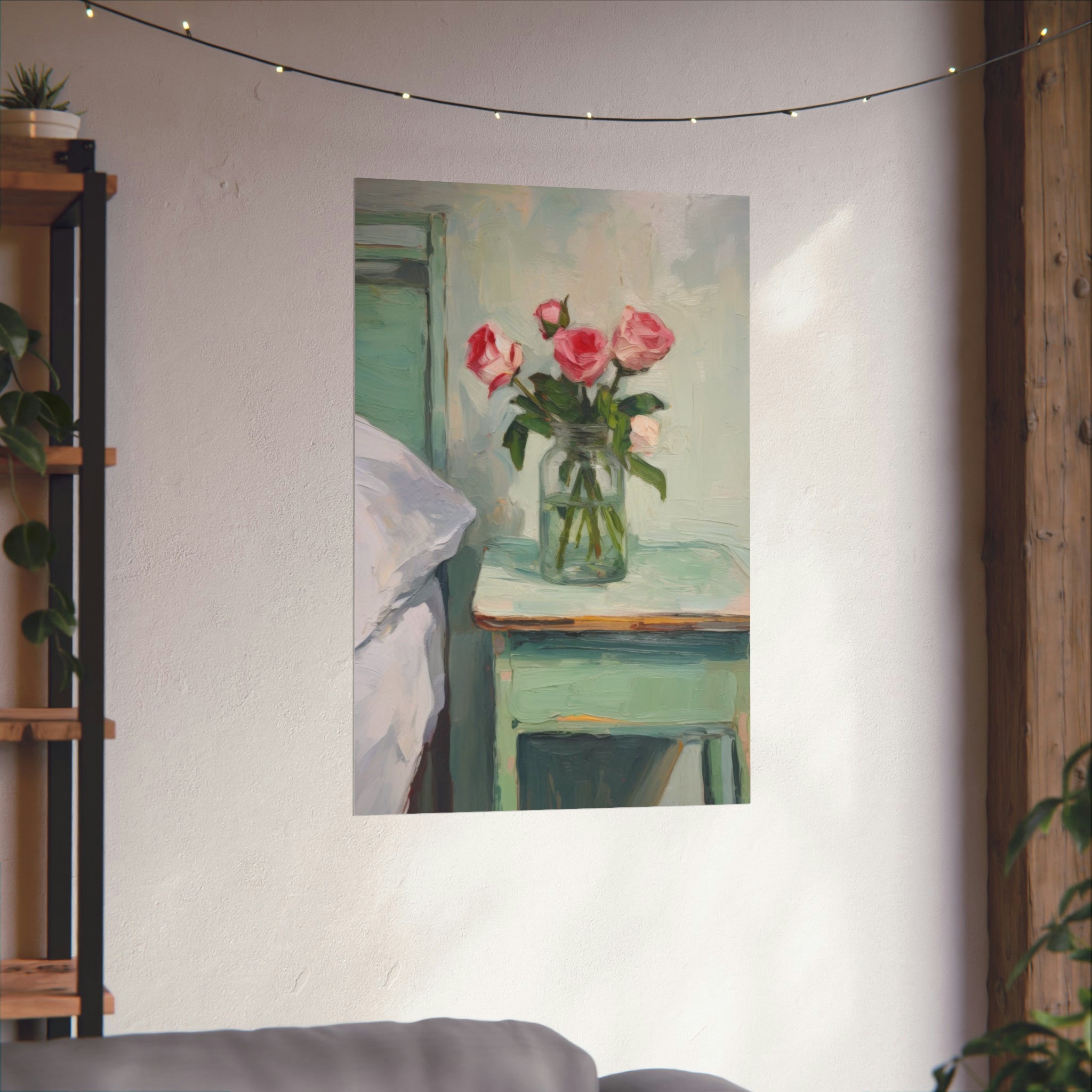 A framed wall art for the living room, showcasing a vase with roses next to a draped cloth, displayed on a wall with string lights above it printed by Printify's "When You Sleep" Large Matte Poster in 3 sizes.