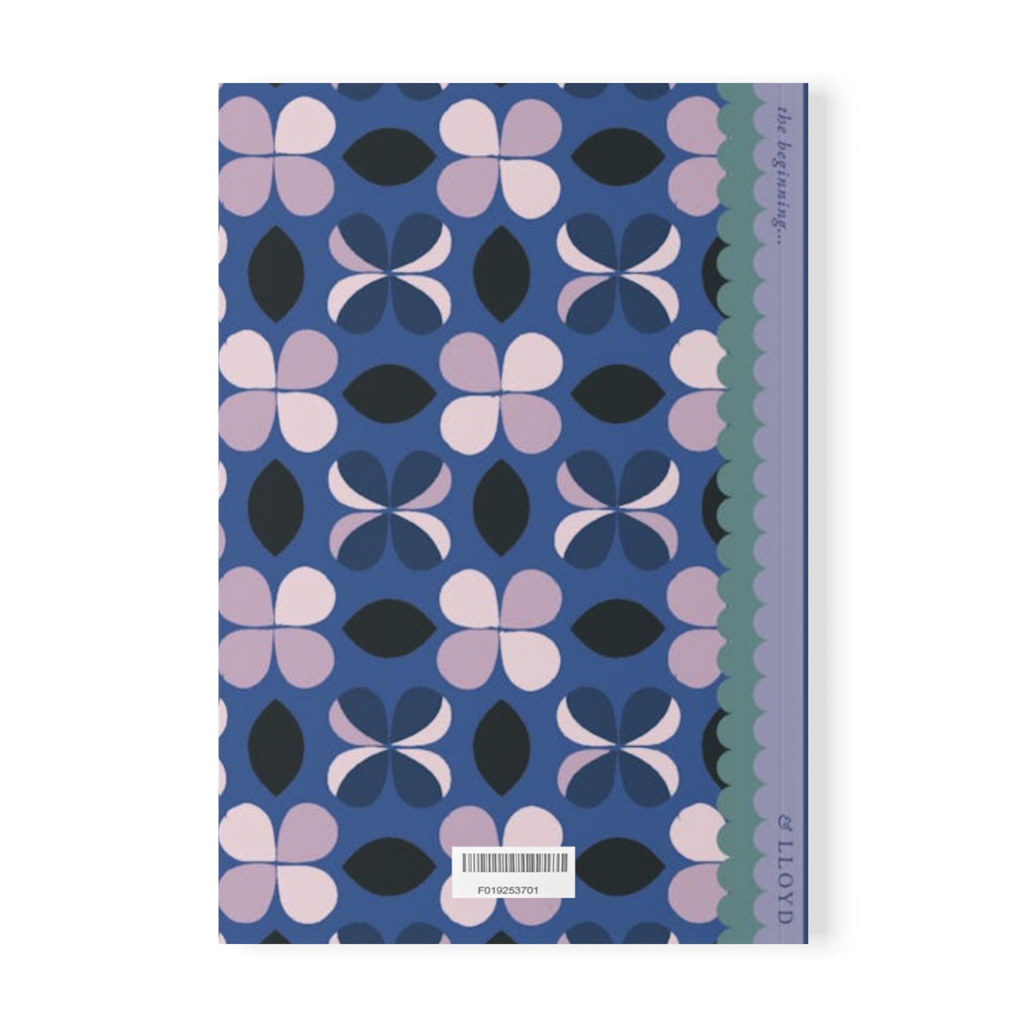 A laminated cover graces this blue geo Softcover Notebook, A5 by Printify, featuring a purple, blue, and black floral pattern with a green scalloped edge on the right side. Inside, you'll find 90gsm lined paper perfect for all your writing needs. A barcode is present on the lower part of the cover.