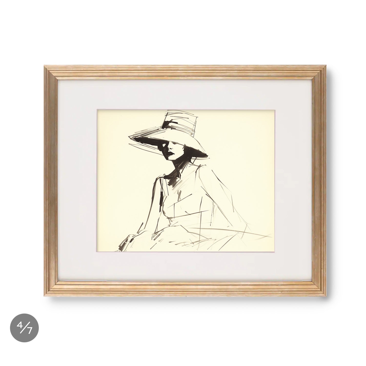 A black and white drawing of a woman in a hat displayed on a Stannie & Lloyd gallery wall adorned with art and frames from the Gallery Wall | Holiday | 7 Piece Set.