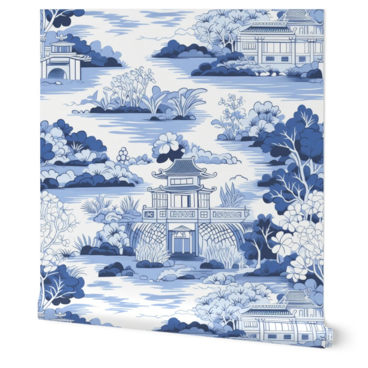 A fabric with a Large Blue Chinoiserie Wallpaper by Stannie & Lloyd featuring pagodas, trees, water scenes, and wall decor.