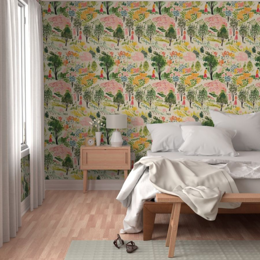 A cozy bedroom with walls adorned with Stannie & Lloyd's A Quiet Walk Wallpaper, featuring a neatly made bed with white bedding and a wooden bench at its foot.