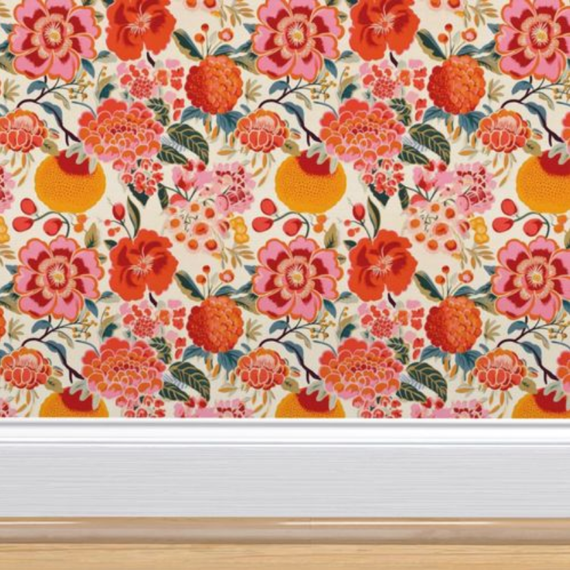 Vintage art Pink Berries & Flowers wallpaper with a variety of orange-toned flowers and fruits above a white baseboard, creating exquisite wall decor from Stannie & Lloyd.