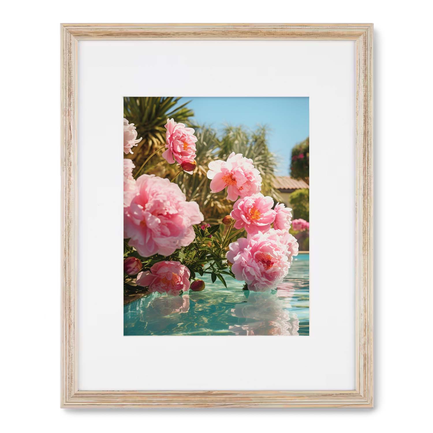 Framed art of pink flowers in a Poolhouse with Stannie & Lloyd wood frame.