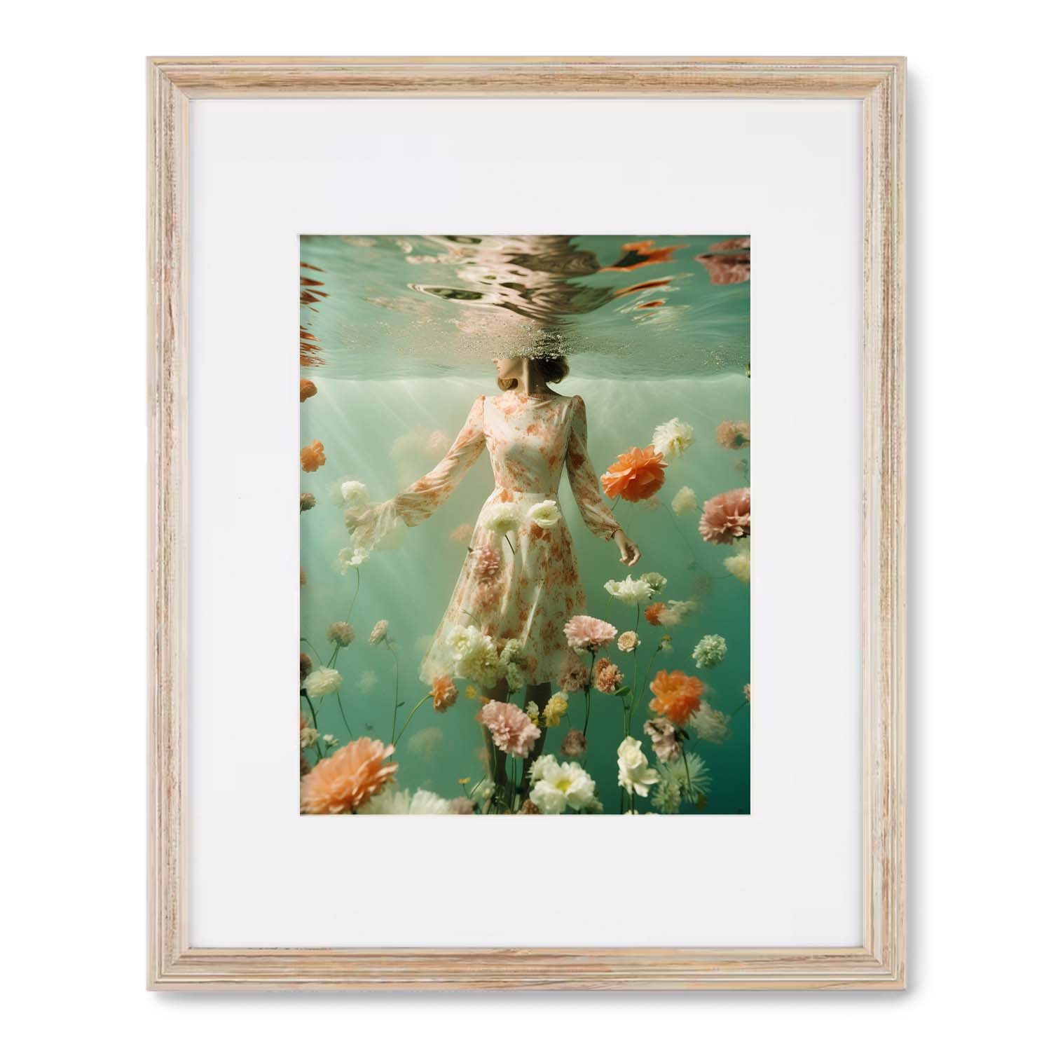 A framed photo of "She Drifted" by Stannie & Lloyd, featuring a woman in a dress under water with flowers, surrounded by a beautiful wood frame.