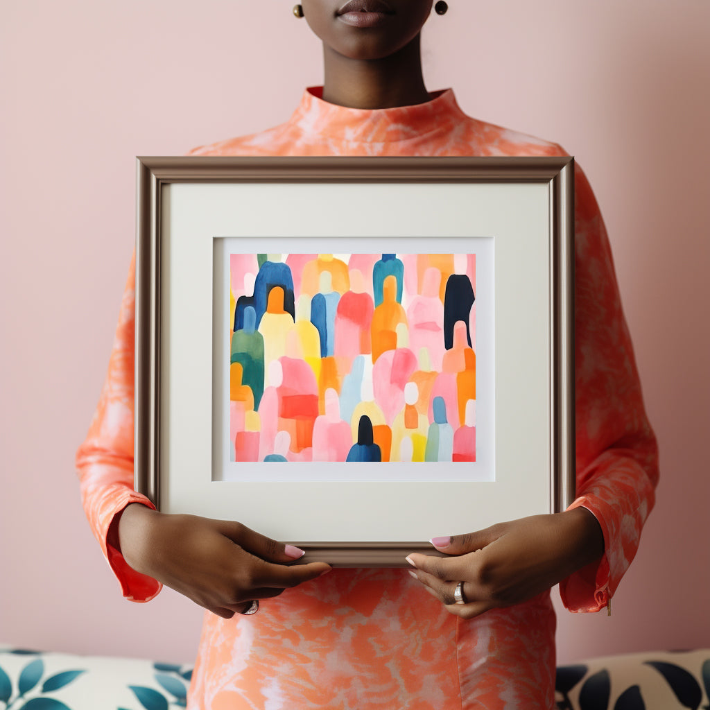 A woman showcasing a vibrant framed art print.