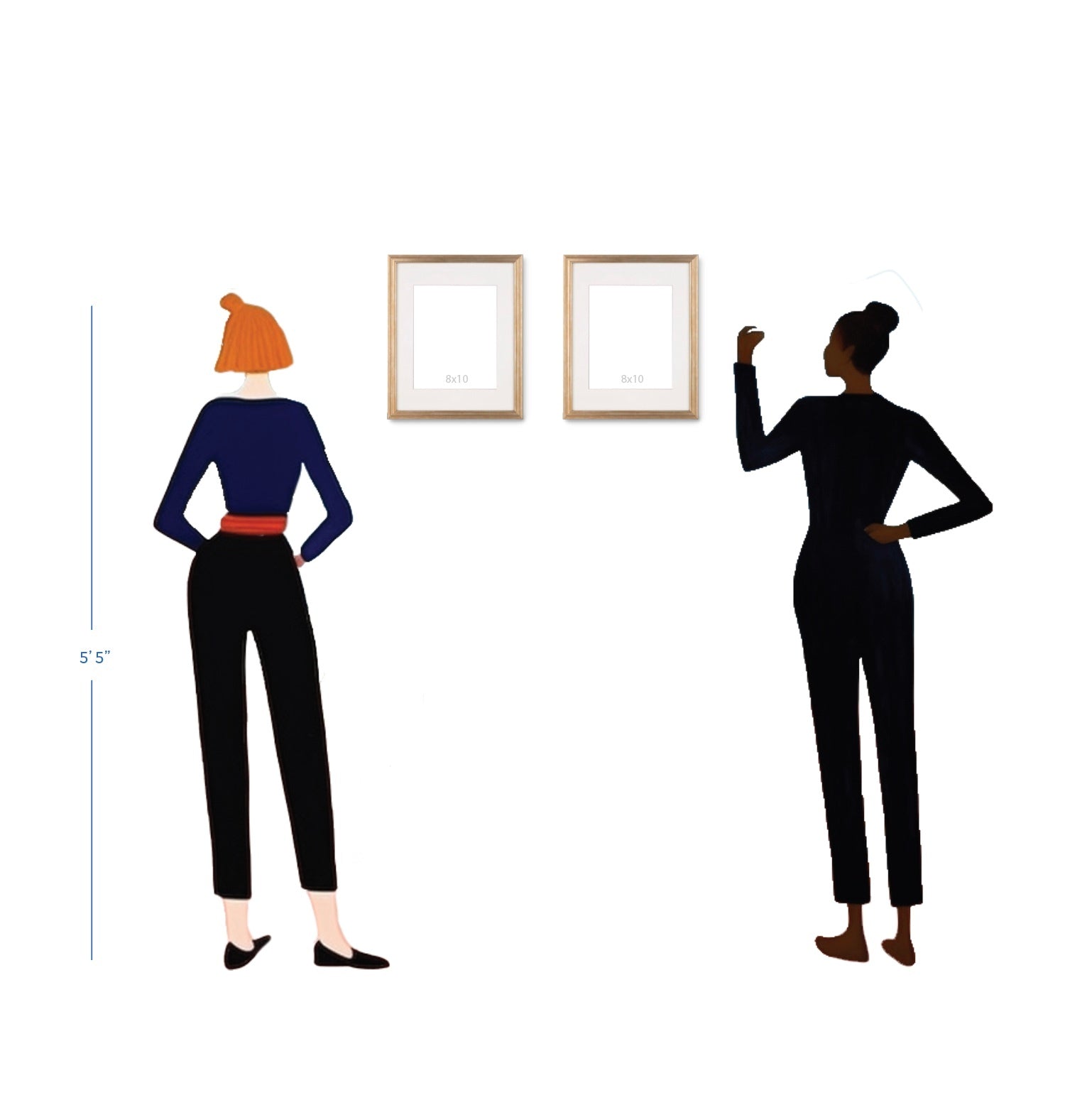 Two women standing next to two framed pictures on a Stannie & Lloyd Gallery Wall | Holiday | 7 Piece Set.